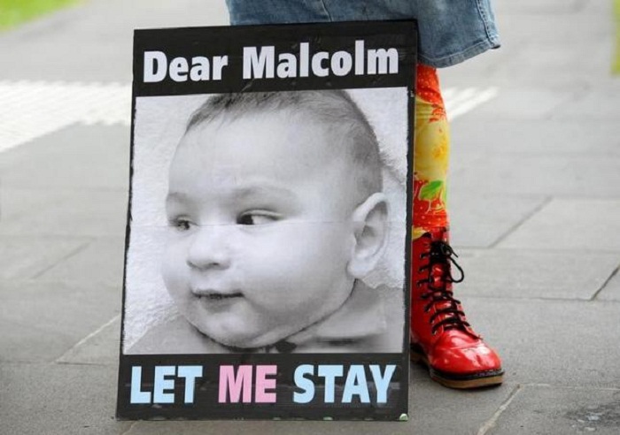 Infant refugee becomes face of Australia`s tough asylum seeker policies